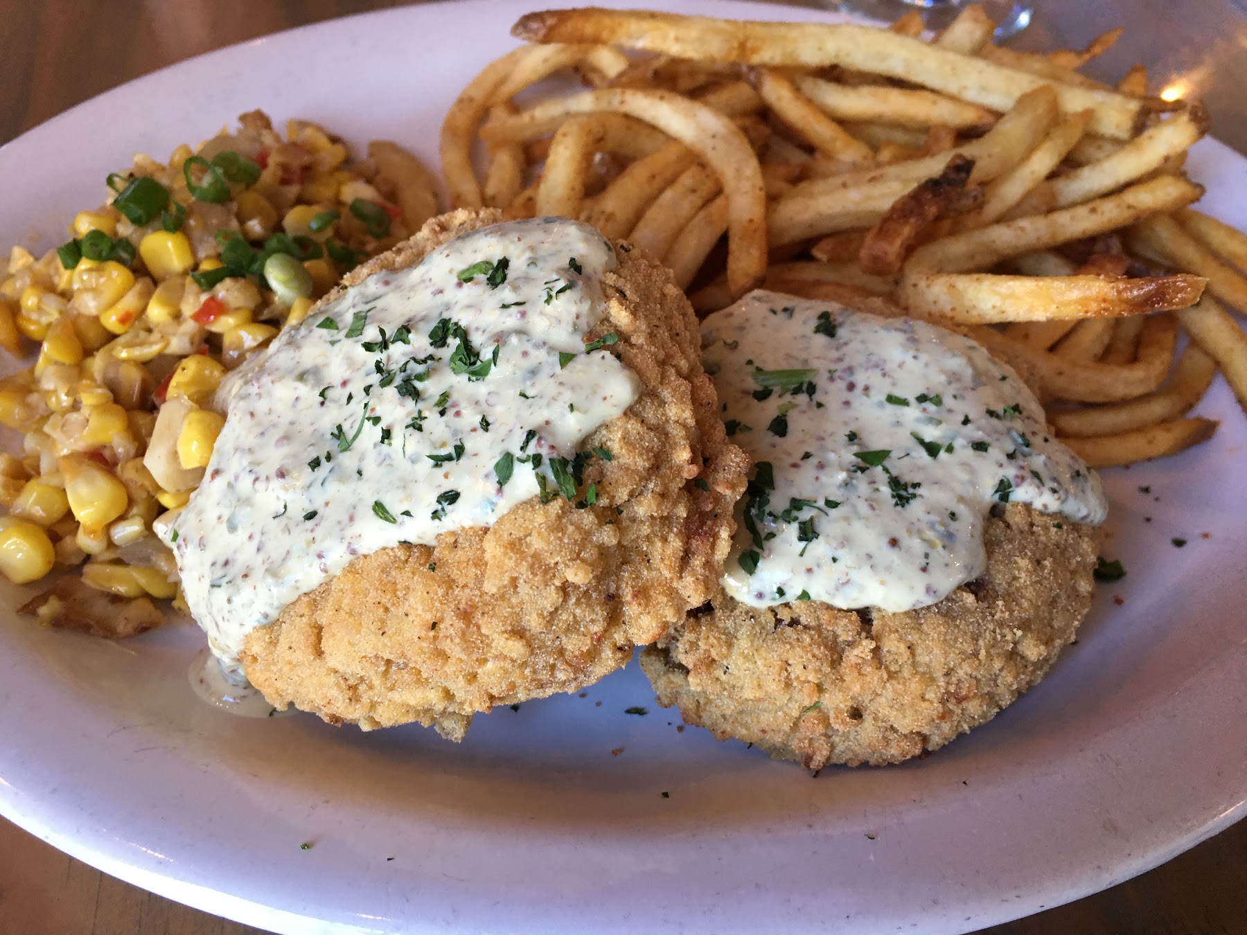 Eliza Restaurant signature dishes Crawfish Etouffee
Crab Cakes
Fried Oysters